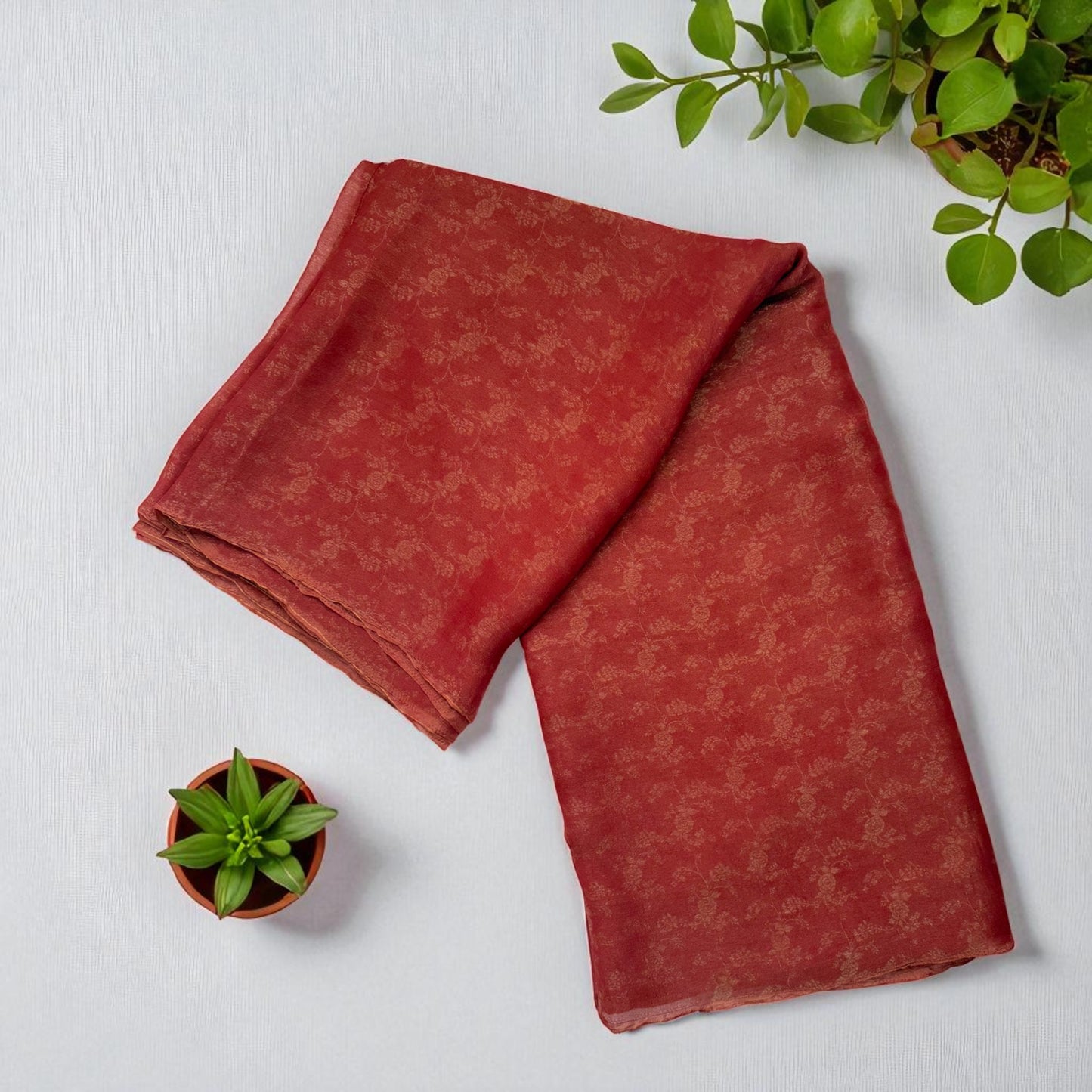 Brick Orange Tissue Saree with Geometric design sequence Blouse