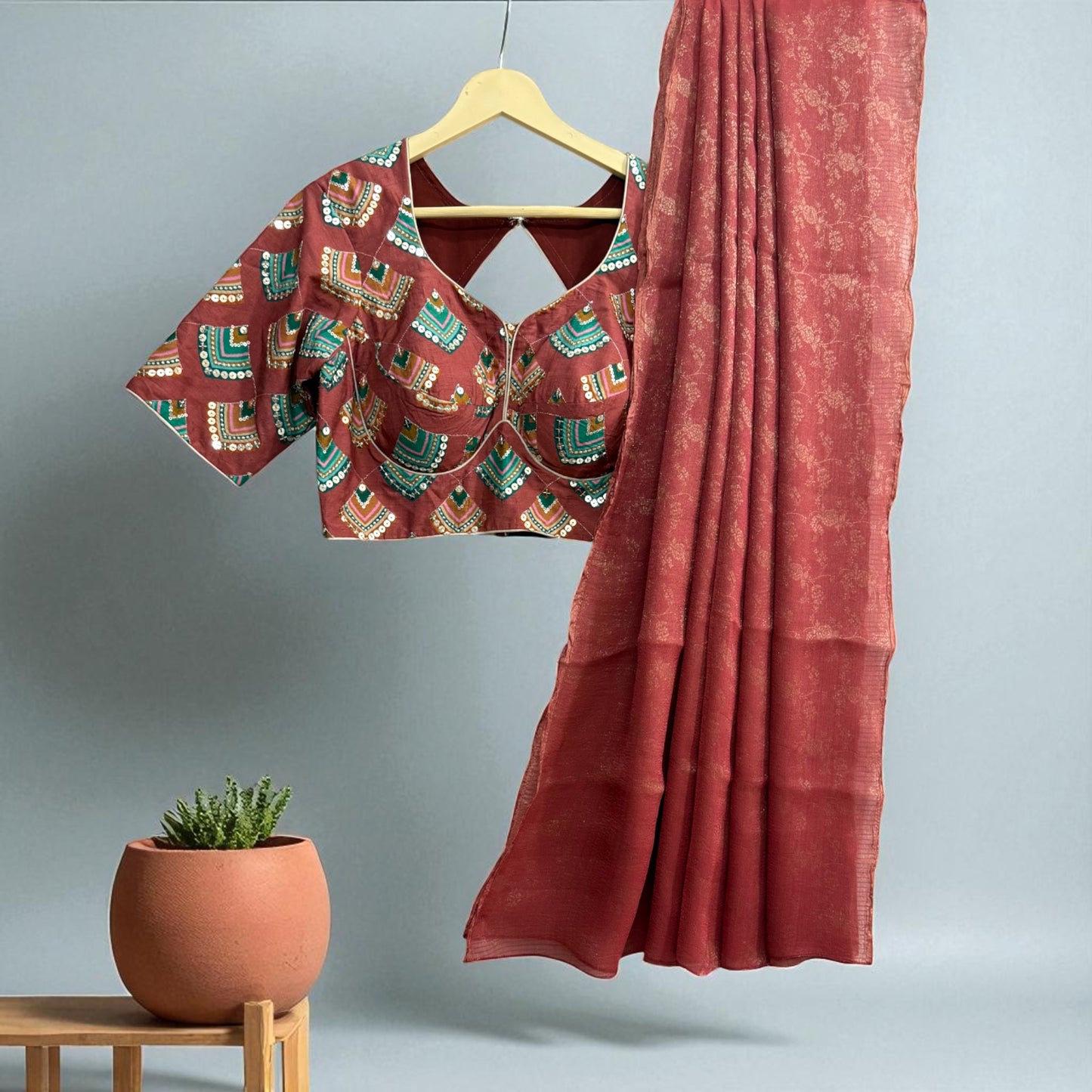 Brick Orange Tissue Saree with Geometric design sequence Blouse