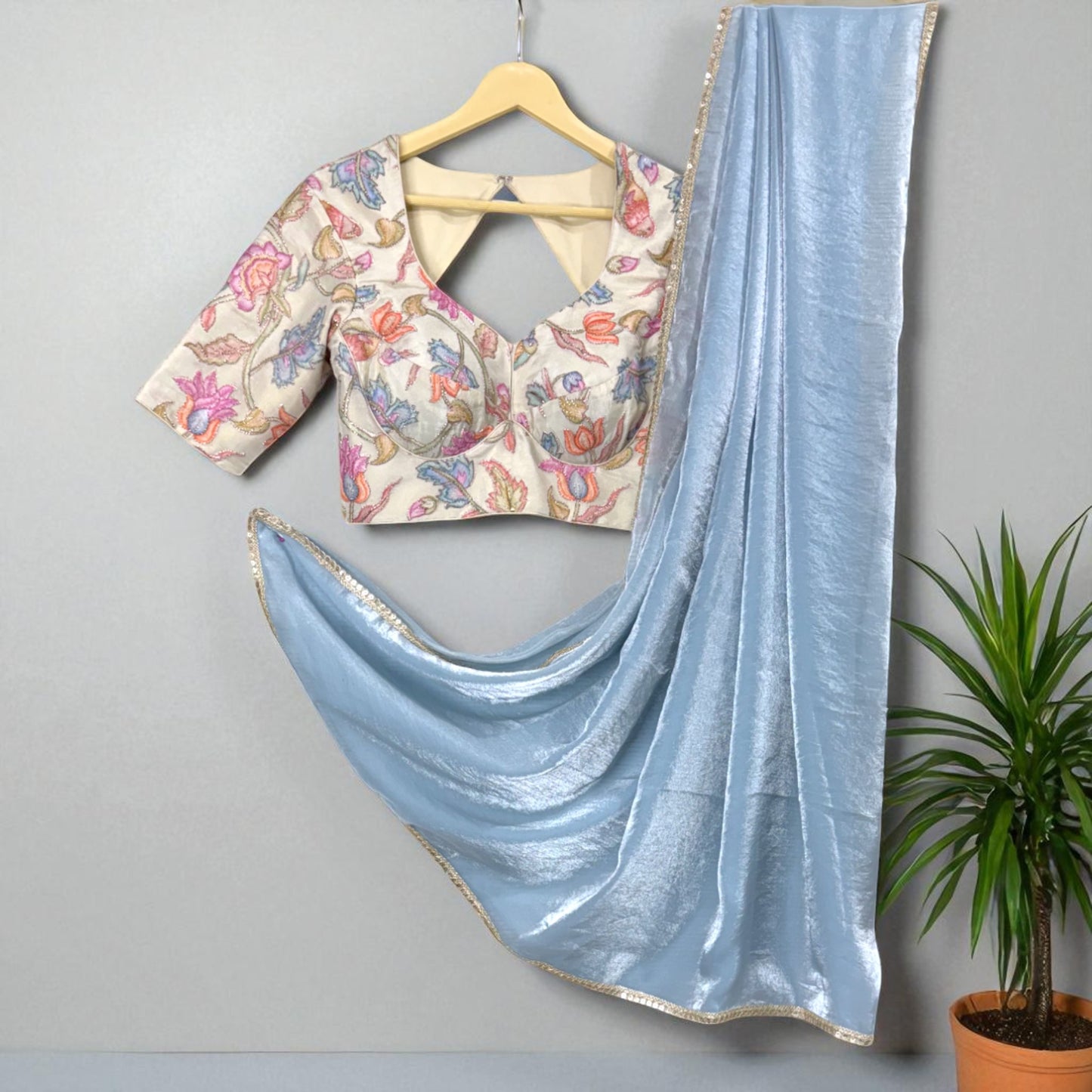 Powder Blue Shimmer Saree with Multicolor Embroidered Blouse