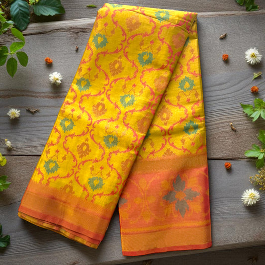 Golden Tissue Saree with Ikat-Inspired Motifs